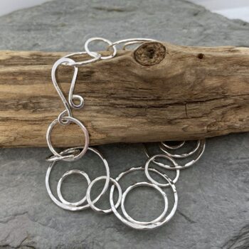 Eccentric circles silver chain bracelet