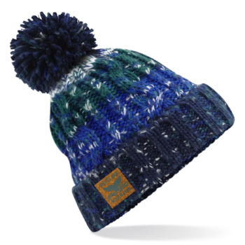 A dark blue and light blue knitted pom pom beanie hat.