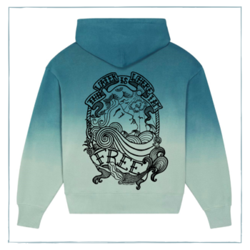 A hoodie in shades of blue, with a print of a woman's face, surrounded by the words 'The water is where I am free' and a mermaid.