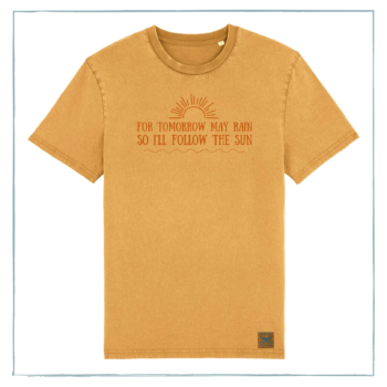 A vintage gold t-shirt with the words 'For tomorrow may rain so I'll follow the sun' printed across the chest in metallic copper ink.