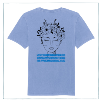 A vintage blue t-shirt with the image of a woman with flowers in her hair printed on it.