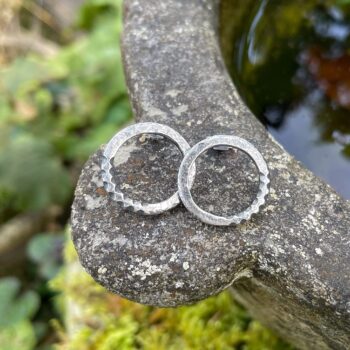 Sterling silver carved circle stud earrings