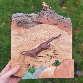 Diving Otter: Original wall art handcrafted from Scottish hardwoods