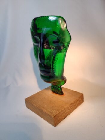 Green bottle art face sculpture