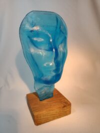 Blue gin bottle face sculpture
