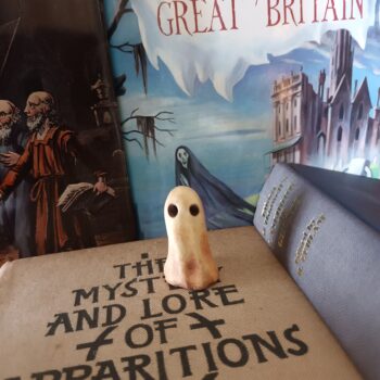 Standing Ghost Statue - Bookshelf Guardian