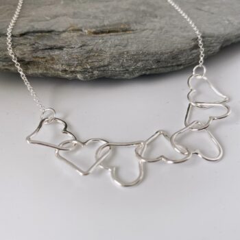 Row of hearts silver necklace