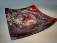 Black, red and white marble swirl glass plate