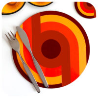 70s style round placemat on a white background