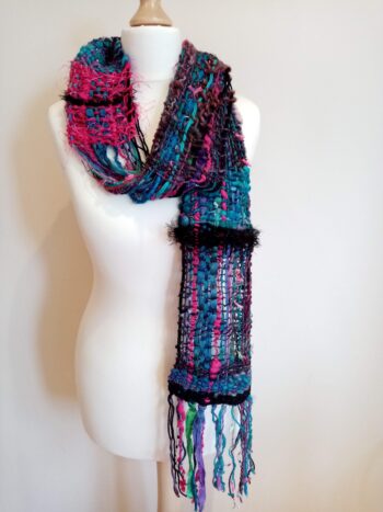 Handwoven black, cerise and turquoise hand spun art yarn scarf