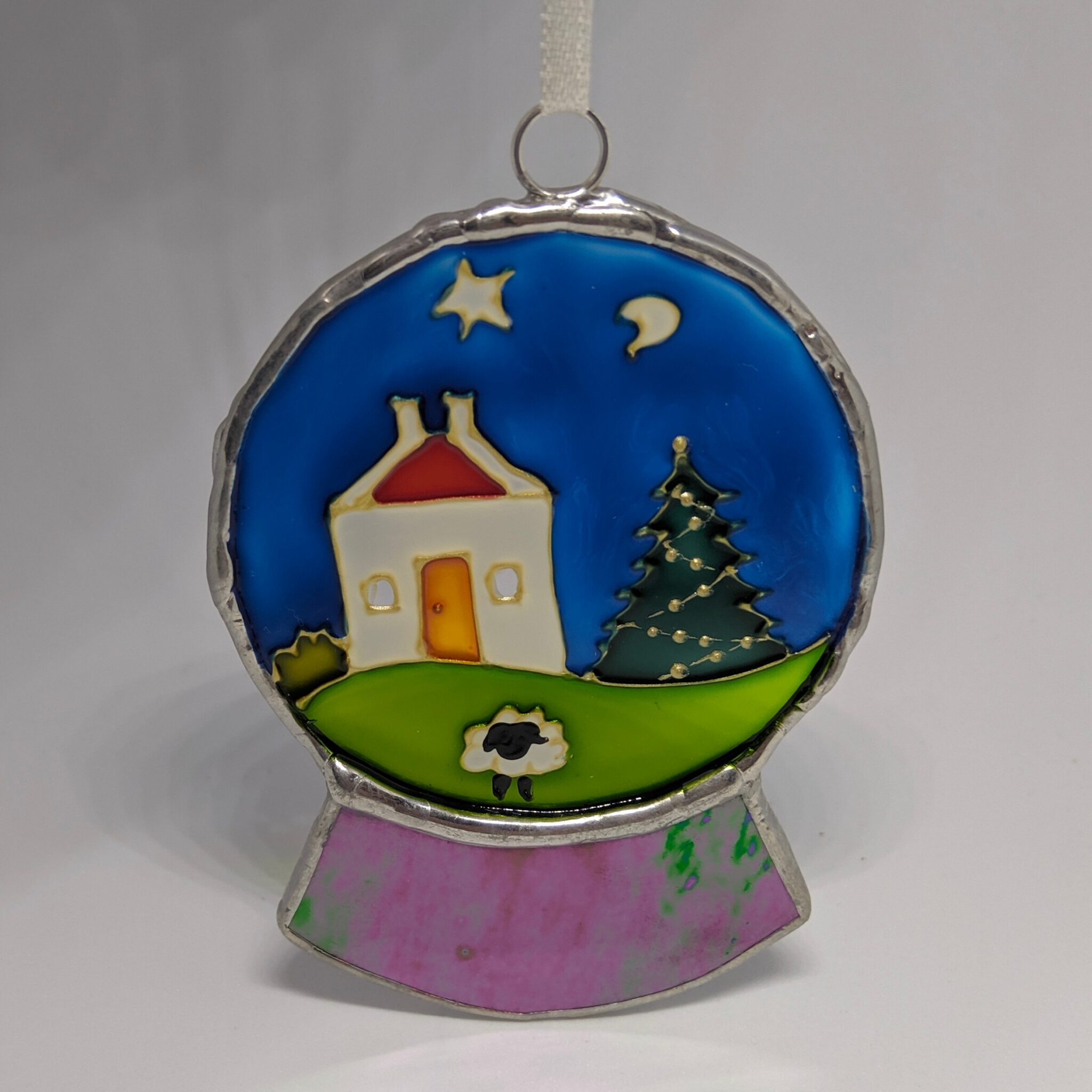 Stained glass snowglobe, winter hare