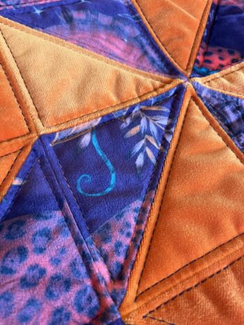 Pair of Orange, Red & Purple Quilted Zero Waste Cushion - Image 3