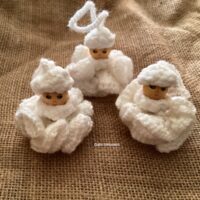 Trio of whimsical crochet snow flake decorations